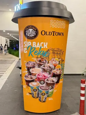 a sip back and keg coffee cup sitting on a street at Jac Urban Suites Luxury & Premium Staycation 10pax in George Town