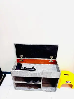 a briefcase with two pairs of shoes in it at Jac Urban Suites Luxury & Premium Staycation 10pax in George Town