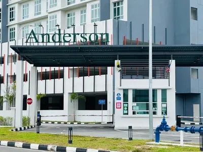 a building with a sign on top of it at CT Hillcrest Loft Ipoh in Ipoh