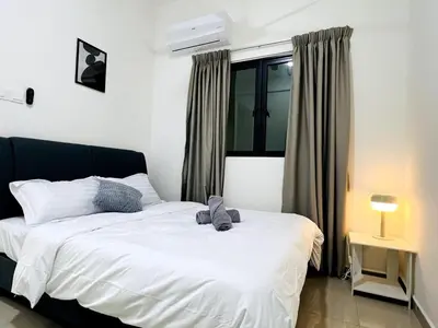 a bedroom with a white bed and a window at Sunshine Residence Kekloksi View 2R 4pax in Ayer Itam