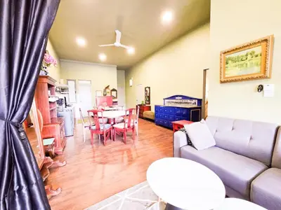 a living room with a couch and a table at Mossy Forest Family Retreat V, Kea Farm, 2-8 guests, Keafarm, Cameron Highlands in Cameron Highlands