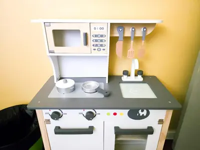 a toy kitchen with a pretend stove and a microwave at Mossy Forest Family Retreat V, Kea Farm, 2-8 guests, Keafarm, Cameron Highlands in Cameron Highlands