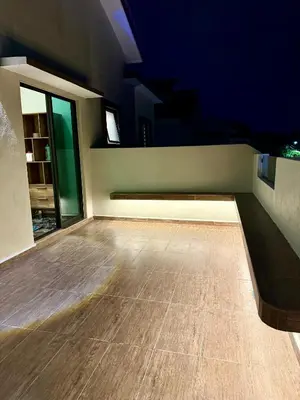 a empty room with a wooden floor in a building at LYL EvenHill Private Pool-18-23pax 5BR in Ipoh
