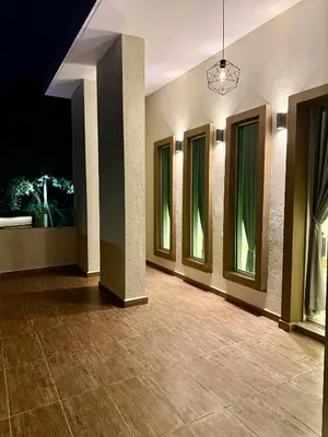 a empty room with a row of windows and a pendant light at LYL EvenHill Private Pool-18-23pax 5BR in Ipoh