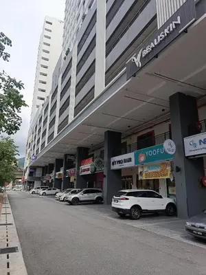 a row of cars parked in front of a building at The Sun condo at taman sri nibong ,near queenbaymall in Bayan Lepas