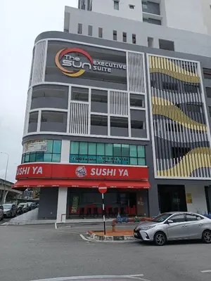 a building with a car parked in front of it at The Sun condo at taman sri nibong ,near queenbaymall in Bayan Lepas