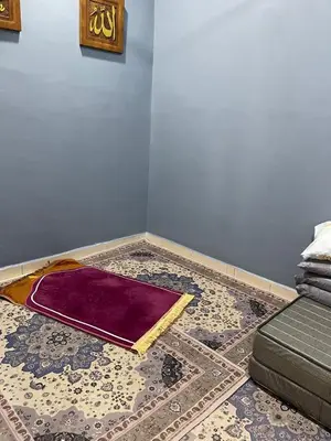 a room with a purple rug on the floor at COZY Residence Homestay Teluk Senangin Lumut in Lumut