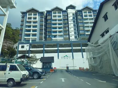 a parking lot in front of a large building at Palas Horizon Kea Farm 2-9 pax 180 View Cameron in Brinchang