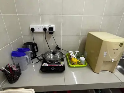 a kitchen counter with a mixer and a pot on it at \u73ed\u53f0212\u6c11\u5bbf Pantai Remis in Pantai Remis