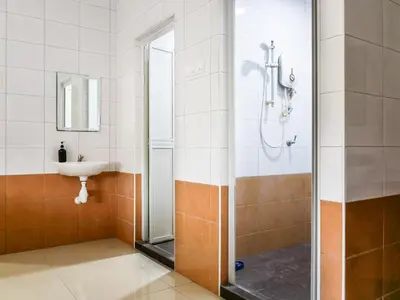 a bathroom with a shower and a sink at Wishful Guesthouse at Georgetown#LohGuanLye#BudgetStay in George Town