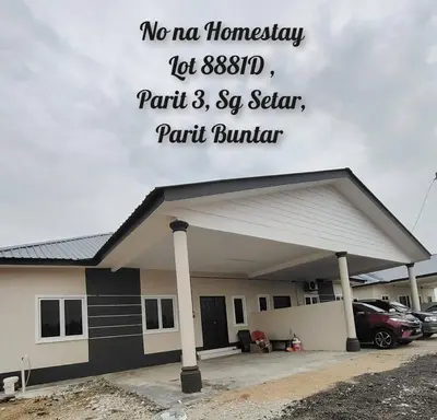 a building with a sign that reads no no homesteadery let at Nona Homestay in Parit Buntar