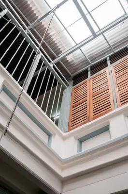a ceiling with wooden windows in a building at Aayu Heritage - Heritage Home in Stewart Lane in George Town