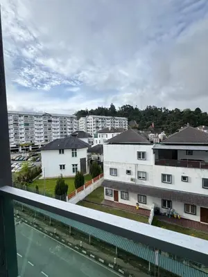 a view from the balcony of a apartment building at AYAAN PLATINUM Foosball Home at Quintet Apartment Free Parking in Tanah Rata