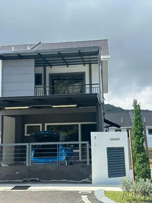 a house with a car parked in front of it at Adik Aisyah cameron semi-D goleden hill homestay in Brinchang