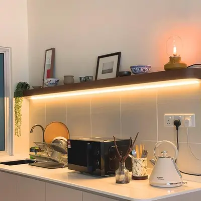 a kitchen counter with a microwave on a counter top at The Heritage 3BR Apartment at Town Centre in Ipoh