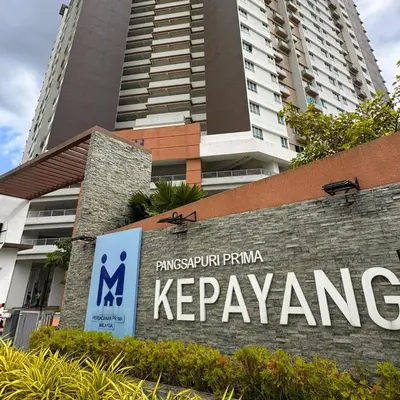 a sign for the kryptonian firm kryptamine in front of a building at The Heritage 3BR Apartment at Town Centre in Ipoh