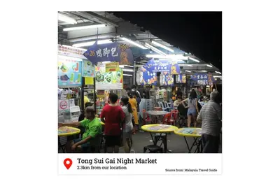 a crowd of people in a market at night at The Bay 6pax 2BR Apartment at Town Centre in Ipoh