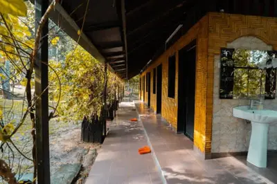 an empty hallway of a building with a sink at Escape to Nature Cozy Terrace Room by the River in Kampong Ulu Dong