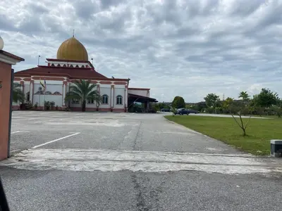 a building with a gold dome on top of it at Sammy Hoomestay Ipoh in Ipoh