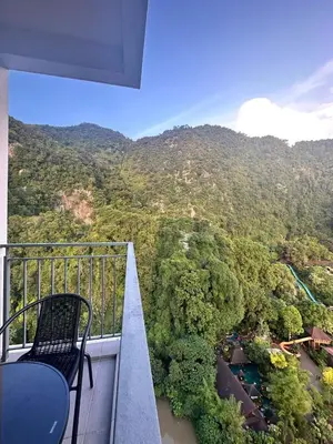 a balcony with a view of a mountain at Sunway Onsen Suites in Tambun