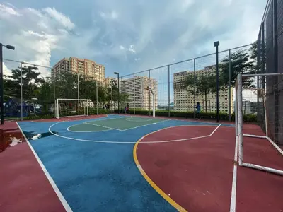 a basketball court in a city with tall buildings at Le Petit Suite - 8 Pax Sea View Infinity Pool in George Town