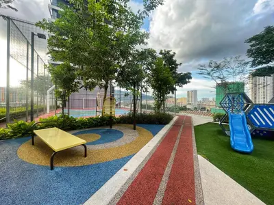 a park with a slide and a playground at Le Petit Suite - 8 Pax Sea View Infinity Pool in George Town