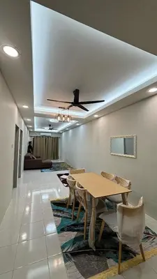 a dining room with a table and chairs at Homestay Tapah by homestay uitm tapah in Tapah Road