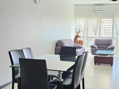 a dining room with a table and chairs at Seaview and 5mins to Paddy Field and Beach in Sekincan
