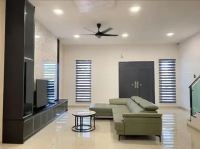 a living room with a couch and a flat screen tv at PaddyView 2-storey Landed GuestHouse 15pax 4R3B \u7a3b\u7530\u4e2d\u592e\u6c11\u5bbf in Sekincan