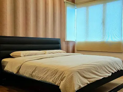 a bedroom with a large bed with a window at \u65e5\u5f0f10\u697c7\u53f7 Comfy Japanese Style Unblocked Paddy View in Sekincan