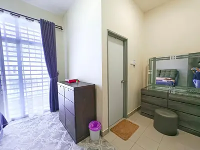 a bathroom with a large mirror and a sink at Premium Homestay - Tol Taiping in Kamunting