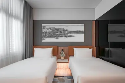 two beds in a hotel room with at Citadines Connect Bertam Georgetown Penang in George Town