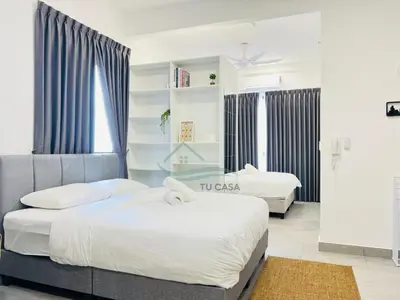 a bedroom with two beds and a window at Venus Suite in Setia Alam 2 in Gua Sai