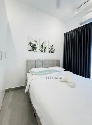 a bedroom with a white bed and a black curtain at Venus Suite in Setia Alam 2 in Gua Sai