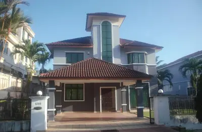 a house with a gate and palm trees at Kulim LakeView Homestay for Msliims Only in Kulim