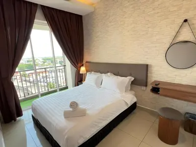 a bedroom with a bed and a large window at G Home 3 - Ipoh City Centre Majestic 2R2B in Ipoh