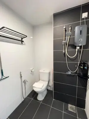 a bathroom with a toilet and a shower in it at G Home 3 - Ipoh City Centre Majestic 2R2B in Ipoh