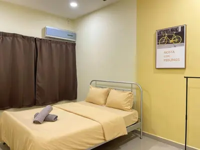a hospital room with a bed and a sign on the wall at Vintage CoLiving 2Storey Haus in Bukit Mertajam