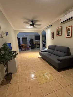 a living room with a couch and a ceiling fan at Casa de' Sara Pool Homestay Ipoh in Ipoh