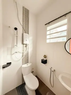 a white bathroom with a toilet and a sink at Fairy 2 Pool Villa Ipoh 26 Pax Kbox Snooker Lego in Ipoh