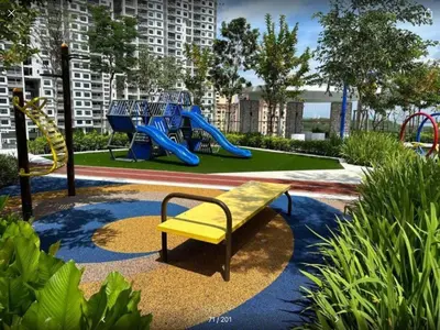 a playground with a yellow bench in a park at Georgetown Penang - Skyline at Urban Suites - Affordable-Luxury-Cozy Stays with Sea and City Views in Jelutong