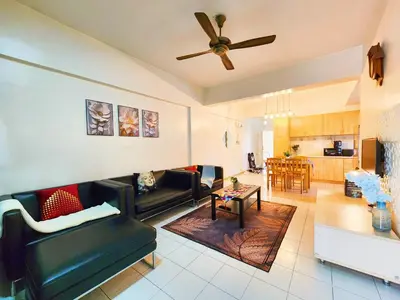 a living room with couches and a ceiling fan at Klang Prima Bayu Apartment, Taman Bayu Perdana, 42000 Klang in Gua Sai