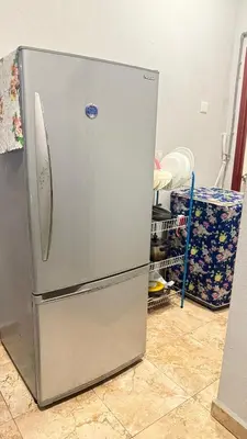a stainless steel refrigerator in a kitchen at Mk homestay butterworth in Butterworth