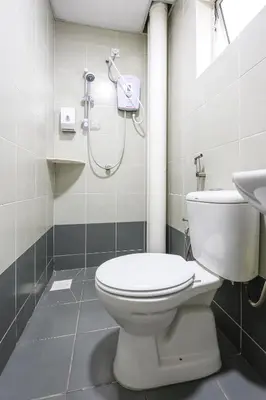 a bathroom with a toilet and a shower at Brinchang Cameron Highland Nest Cool Weather & Cozy 10 Pax Clover Home 8-23A in Brinchang