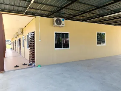 a wall with a speaker on the side of a building at Rsstay Villa in Lunas