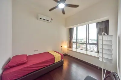 a bedroom with a bed and a large window at Princess Cove R&F Luxury apartment with 3 rooms and 2 bathrooms, for 4-6 people, close to the checkpoint, less than 5 minutes away in Gua Sai