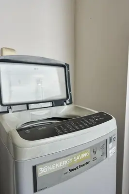 aeryney sewing machine sitting on top of a box at Princess Cove R&F Luxury apartment with 3 rooms and 2 bathrooms, for 4-6 people, close to the checkpoint, less than 5 minutes away in Gua Sai