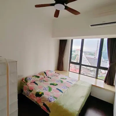a bedroom with a bed and a ceiling fan at Princess Cove R&F Luxury apartment with 3 rooms and 2 bathrooms, for 4-6 people, close to the checkpoint, less than 5 minutes away in Gua Sai