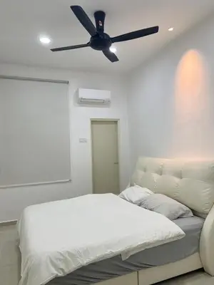 a bedroom with a bed and a ceiling fan at BungalowD Pool Villa 7R6B with Netflix Great Movies & Dramas in Ipoh