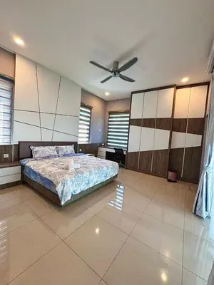 a bedroom with a bed and a ceiling fan at Ipoh VastBlue Escape Pool Villa 6B6B 23Pax in Ipoh